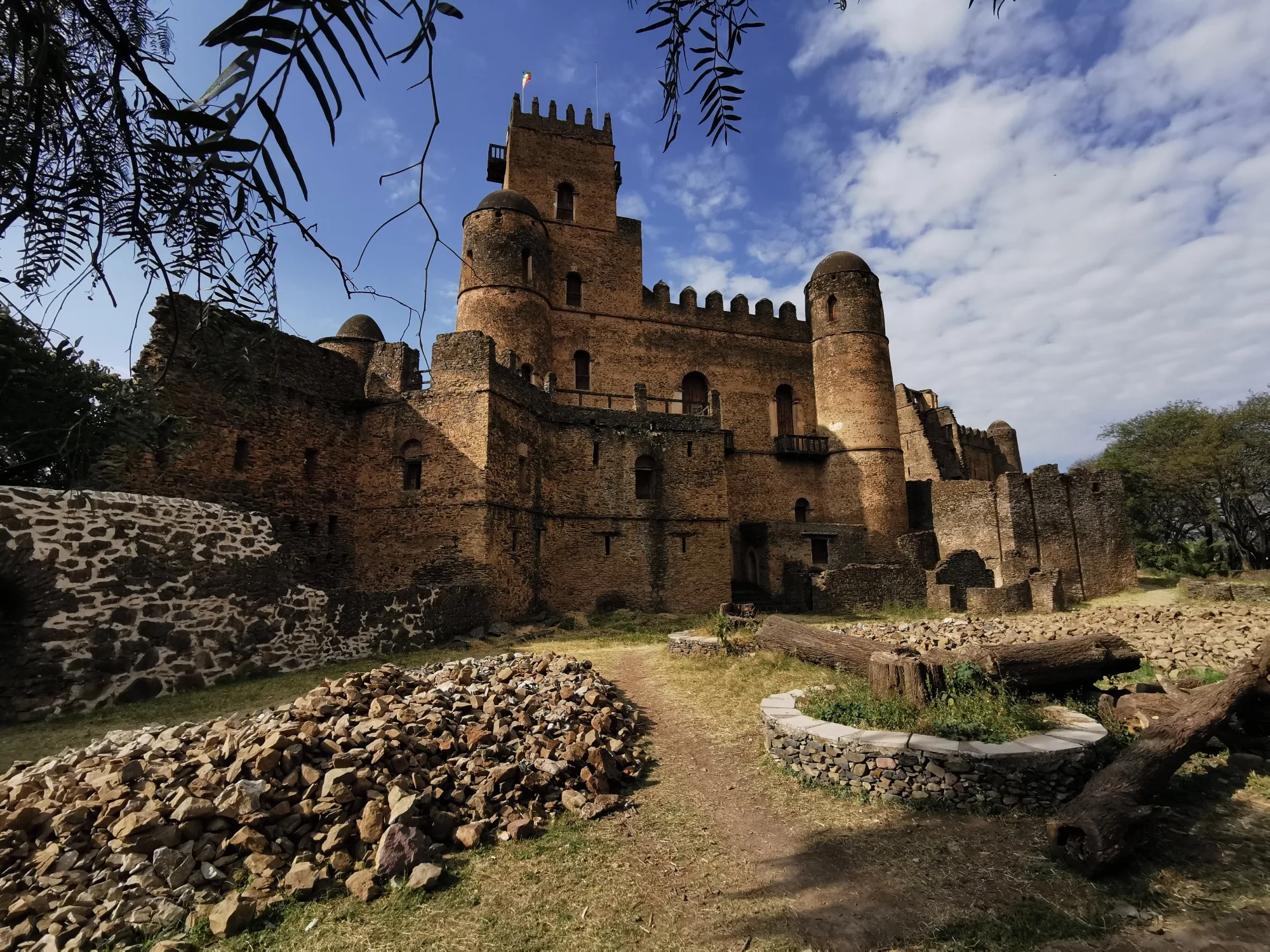 Medieval stone towers and fortified walls of Fasil Ghebbi royal enclosure in Gondar, Ethiopia