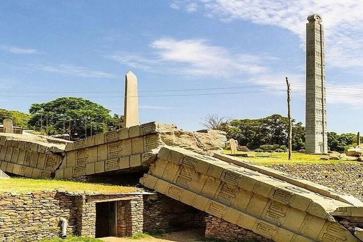 Towering ancient granite obelisk and stelae field in the archaeological park of Axum, Ethiopia